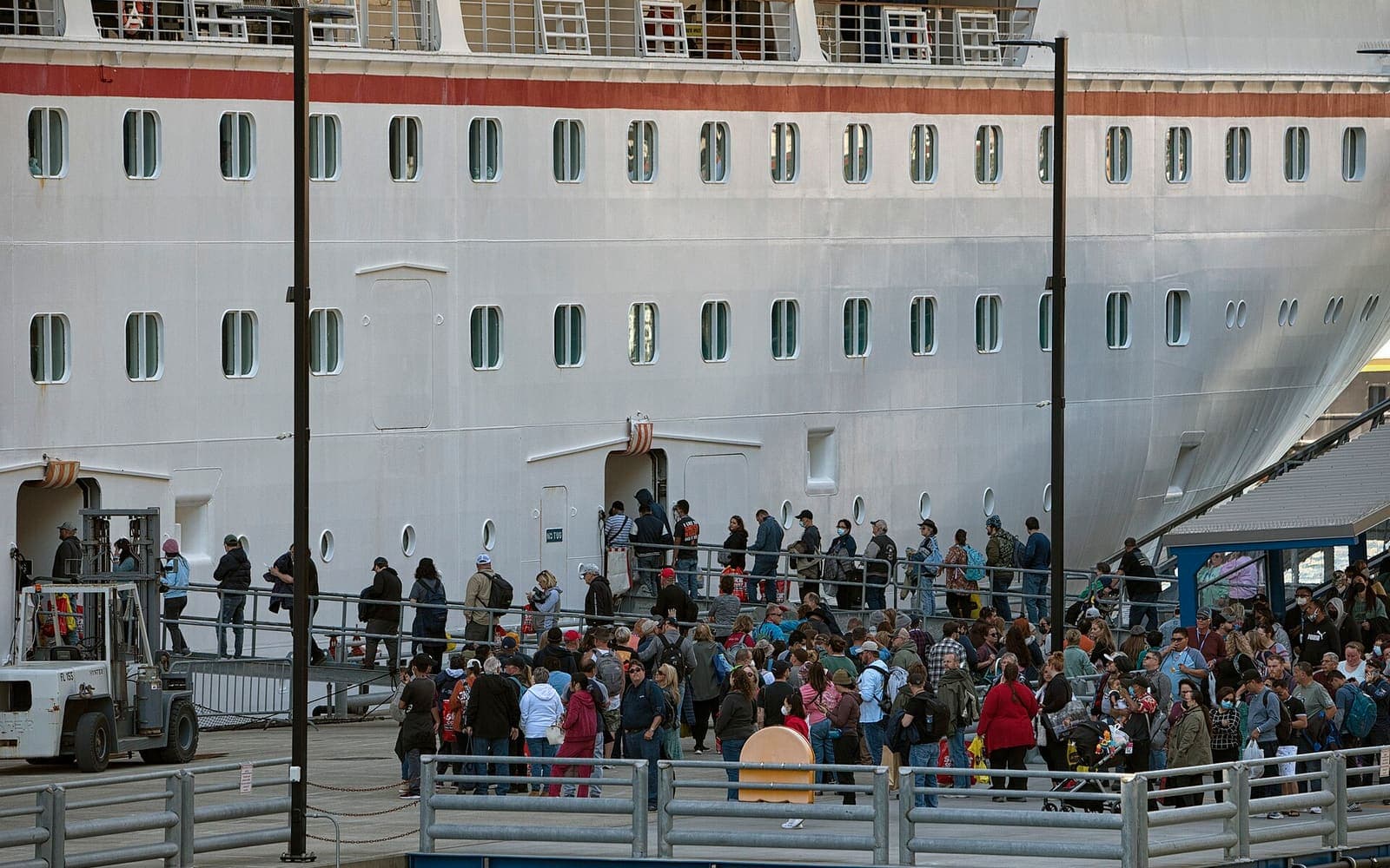 Passengers boarding a cruise ship