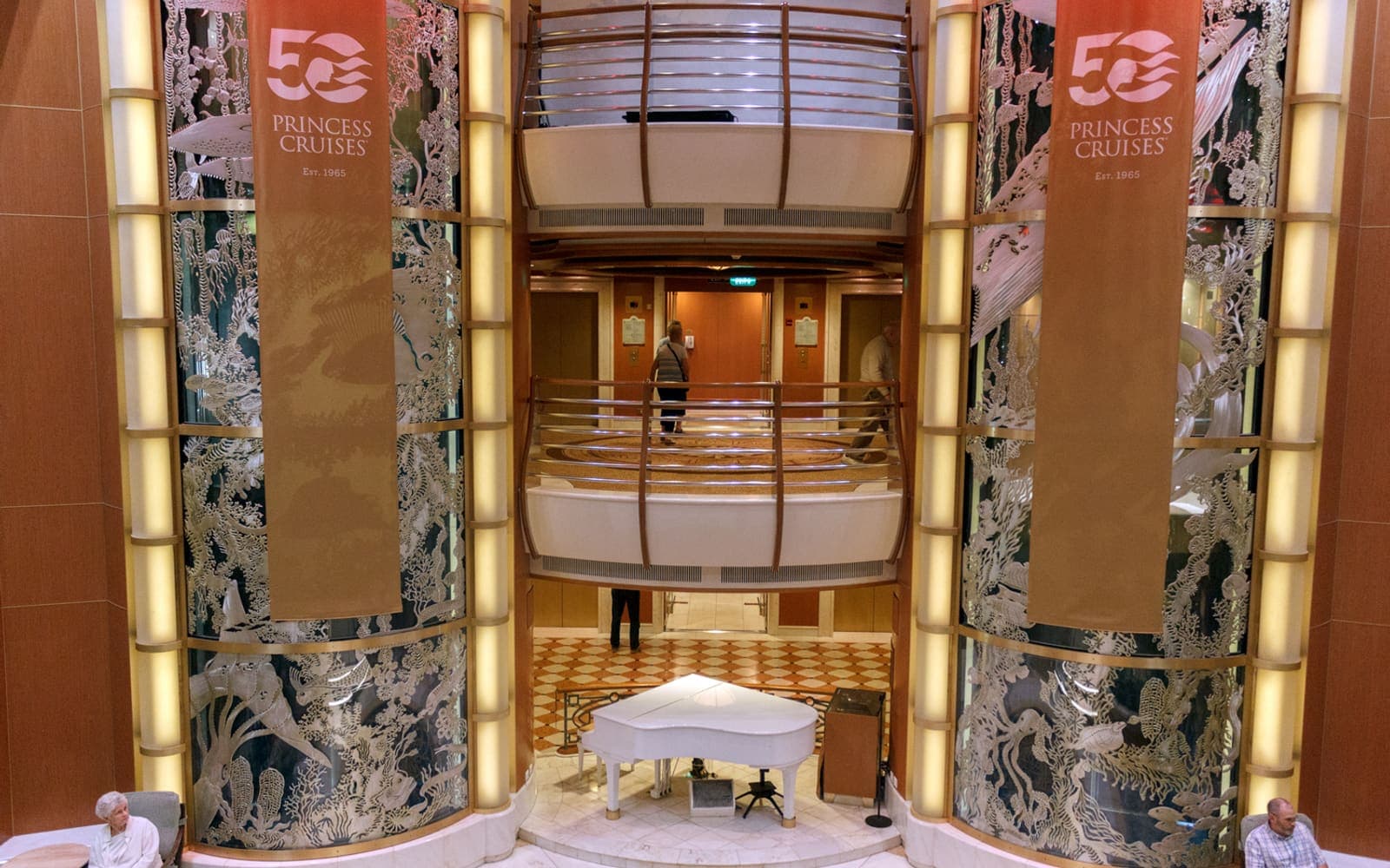 A cruise ship atrium on embarkation day