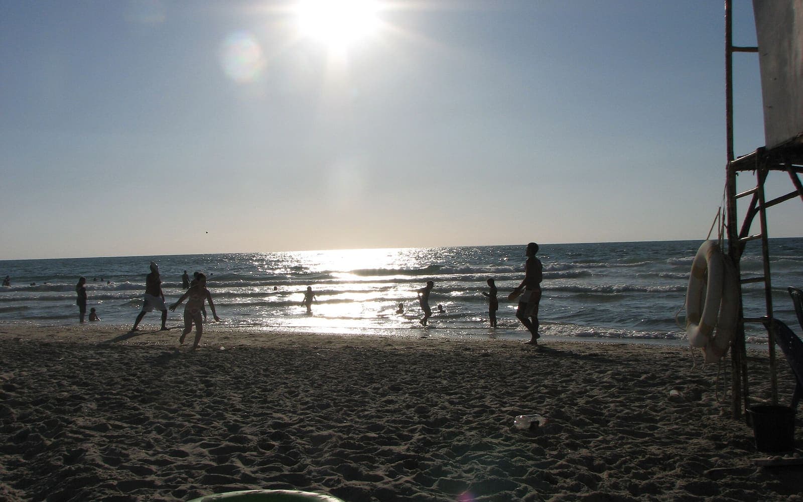 A family at vacation sunset