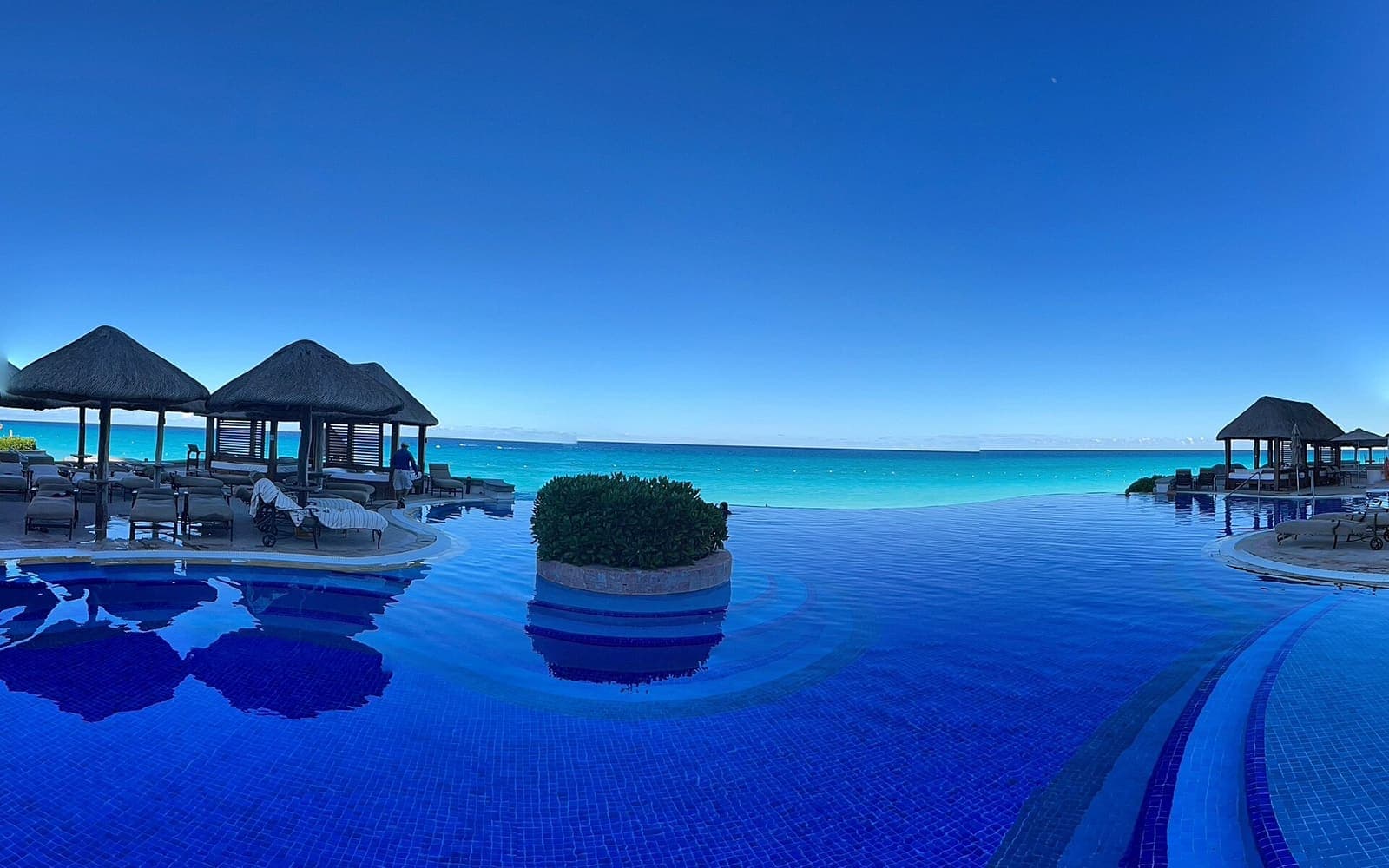 A resort pool and grounds that inclusions actually cover